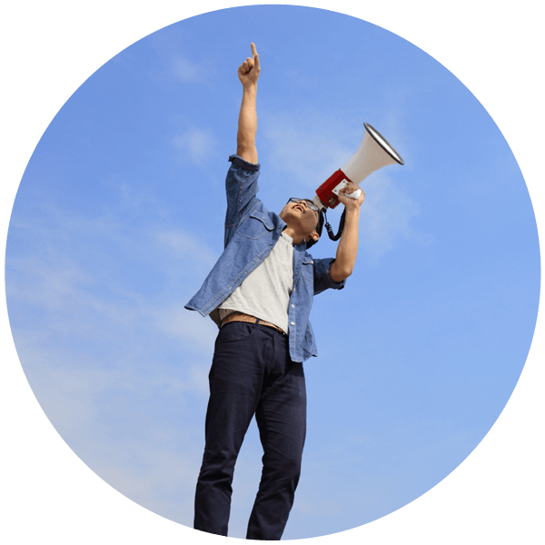 A man holds up a megaphone and points to endless possibilities. The text reads ``Campaign Toolkit, your guide for doing local good.``