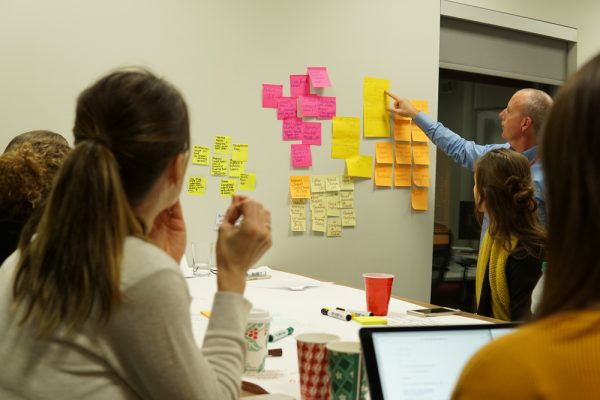 A photo of people in a meeting